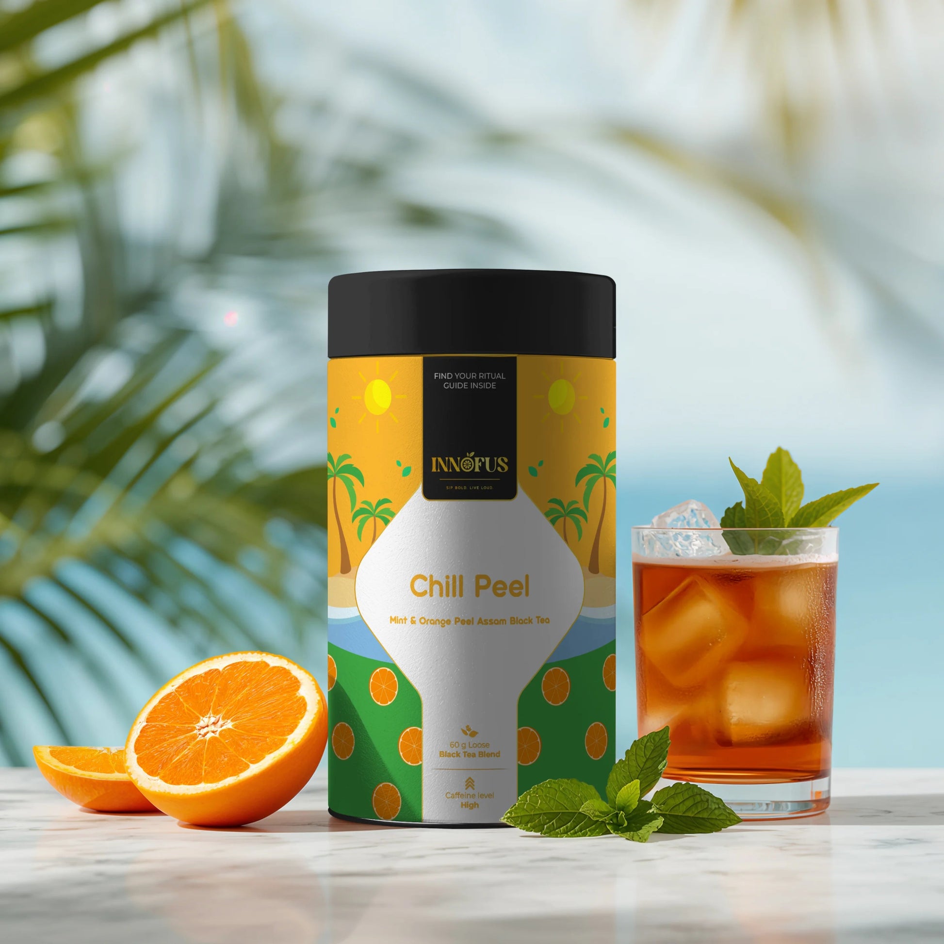 Chill Peel Assam black tea by Innofus, tin with fresh mint, orange, iced tea glass, summer tropical background; bold citrus flavor, refreshing, antioxidant wellness.