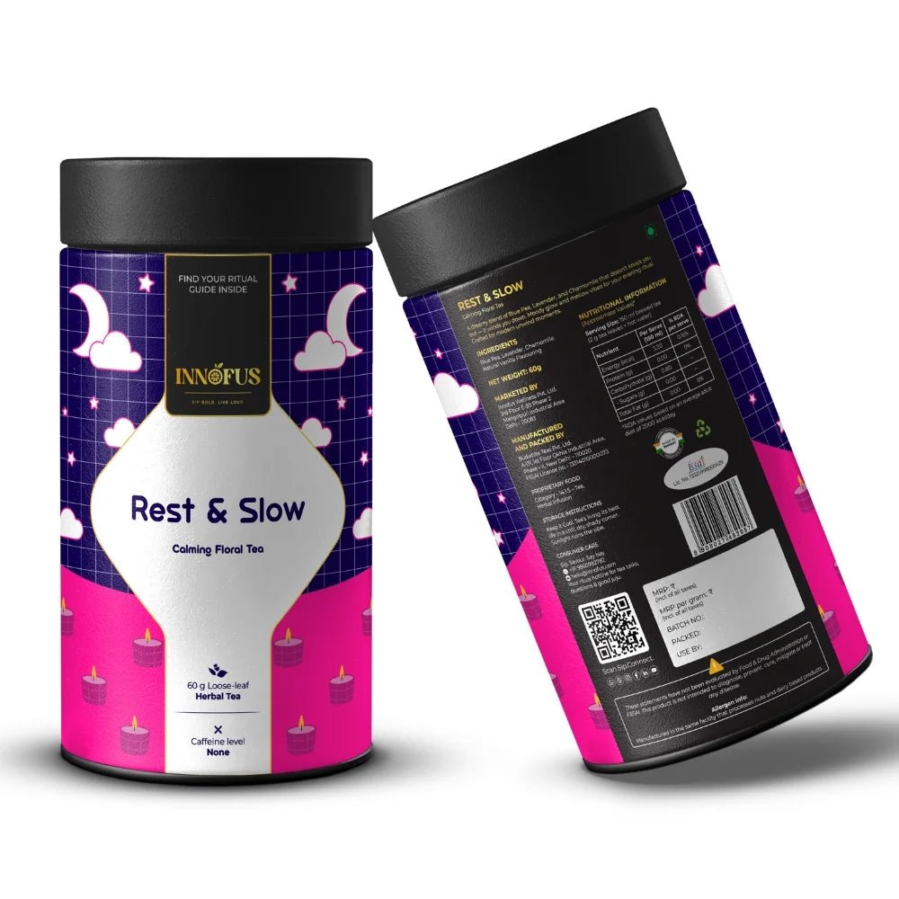 Rest & Slow nighttime calming floral tea by Innofus; blue pea, lavender, chamomile in caffeine-free loose leaf blend, moon/cloud label, front and back nutrition info.