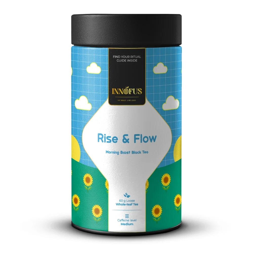 Rise & Flow by Innofus, morning boost black tea, medium caffeine, loose leaf blend in blue sunflower tin, front packaging, clouds and sun illustration, ideal for energy and wellness.