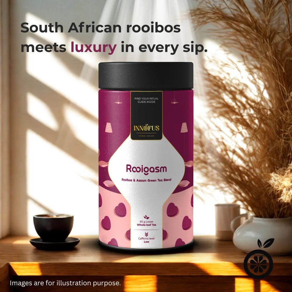 Rooigasm by Innofus, rooibos and Assam green tea blend in airtight tin, peak freshness, planet-friendly, blocks light, reusable packaging, protects whole leaves, teacup and white background